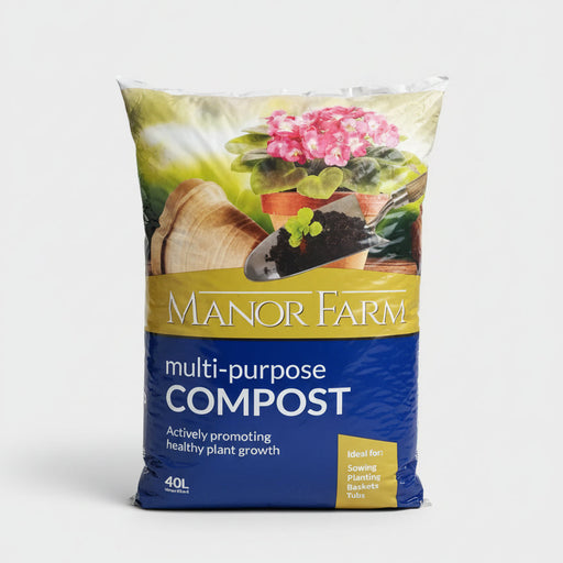 Bag of Manor Farm multi-purpose compost with gardening imagery on a concrete surface.